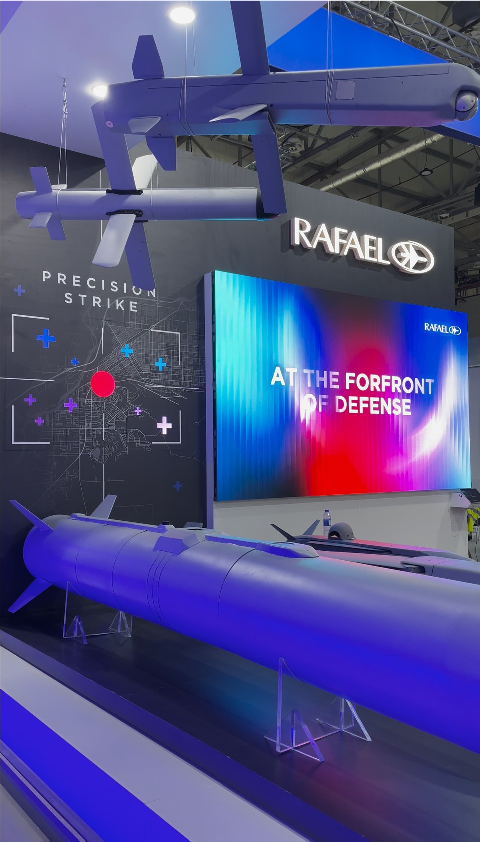 Suspended models and the main screen reading At the Forefront of Defense.